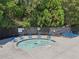 Community splash pad with blue chairs and surrounding trees at 3077 Eastbrook Sw Ter, Atlanta, GA 30331