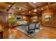 Elegant lobby with hardwood floors, wood-paneled walls, and a Christmas tree at 3201 Lenox Ne Rd # 23, Atlanta, GA 30324