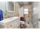 Clean bathroom with white vanity and tiled shower/tub combo at 2256 Fleur Se Dr, Marietta, GA 30060