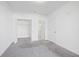 Bedroom with grey carpet and spacious walk-in closet at 525 Parkway Ne Dr # 217, Atlanta, GA 30308