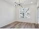 Bright bedroom with hardwood floors and access to a balcony at 525 Parkway Ne Dr # 217, Atlanta, GA 30308