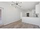 Bright dining area with hardwood floors and modern light fixture at 525 Parkway Ne Dr # 217, Atlanta, GA 30308