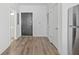Spacious entryway with hardwood floors and modern doors at 525 Parkway Ne Dr # 217, Atlanta, GA 30308