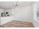 Modern kitchen with stainless steel appliances and breakfast bar at 525 Parkway Ne Dr # 217, Atlanta, GA 30308