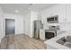 Modern kitchen with stainless steel appliances and white cabinets at 525 Parkway Ne Dr # 217, Atlanta, GA 30354