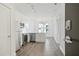 Open concept kitchen with stainless steel appliances and hardwood floors at 525 Parkway Ne Dr # 217, Atlanta, GA 30308