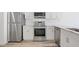 Modern kitchen with stainless steel appliances and white cabinets at 525 Parkway Ne Dr # 217, Atlanta, GA 30308