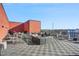 Spacious rooftop deck with multiple seating areas and city views at 525 Parkway Ne Dr # 217, Atlanta, GA 30308