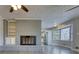 Living room with built-in shelving and a brick fireplace at 3856 Woodyhill Dr, Lithonia, GA 30038