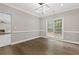 Bright dining room with hardwood floors and neutral walls at 2617 Spring Cast Dr, Buford, GA 30519