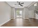 Living room with large window and ceiling fan at 2617 Spring Cast Dr, Buford, GA 30519