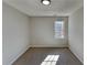 Simple bedroom with neutral walls and carpet at 3245 Country Walk Dr, Powder Springs, GA 30127