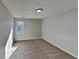 Well-lit bedroom with neutral walls and carpet at 3245 Country Walk Dr, Powder Springs, GA 30127