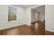 Bright living room with hardwood floors and wainscoting at 1655 Murdock Rd, Marietta, GA 30062