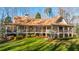 Picturesque log home nestled among trees at 697 Hillwood Ct, Dacula, GA 30019