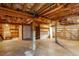 Unfinished basement with high ceilings and ample storage shelving at 3103 Snapfinger Ln, Decatur, GA 30034