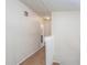 Upstairs hallway with carpeted flooring and access to bedrooms at 3103 Snapfinger Ln, Decatur, GA 30034