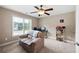 Bright bedroom with comfy couch and workspace at 416 Telfair Way, Canton, GA 30115