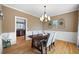 Formal dining room with hardwood floors and chandelier at 416 Telfair Way, Canton, GA 30115