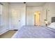 Bedroom with queen bed, closet, and access to hallway at 1406 Mozley Pl, Atlanta, GA 30314