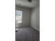 Bright bedroom with carpeted floor and large window at 2822 Saratoga Lake Vw, Decatur, GA 30034