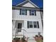 Two-story home with white siding, black shutters, and a front porch at 2822 Saratoga Lake Vw, Decatur, GA 30034