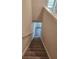 Carpeted staircase leading from the second floor to the first at 2822 Saratoga Lake Vw, Decatur, GA 30034