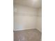 Large walk-in closet with wire shelving and neutral carpeting at 2822 Saratoga Lake Vw, Decatur, GA 30034