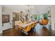 Bright dining room with hardwood floors and modern chandelier at 3028 Pruitt Ln, Smyrna, GA 30080