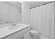 Simple bathroom with white vanity and shower at 3227 Bartee Walk, Suwanee, GA 30024