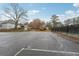 Parking lot with view of tennis court and clubhouse at 3455 Summit Trl, Cumming, GA 30041