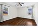 Bright bedroom with hardwood floors and large windows at 517 Woodrow Ave, Atlanta, GA 30354