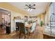 Bright dining room with hardwood floors and fireplace at 485 Kensington Parc Dr, Avondale Estates, GA 30002