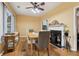 Dining room with hardwood floors, table, and fireplace at 485 Kensington Parc Dr, Avondale Estates, GA 30002