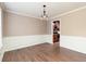 Dining room with hardwood floors and view of kitchen at 1731 Silverchase Sw, Marietta, GA 30008