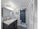 Clean bathroom with marble vanity and a walk-in shower at 32 La Rue Nw Pl, Atlanta, GA 30327