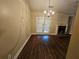 Dining room with hardwood floors and fireplace at 4671 W Lake Se Dr, Conyers, GA 30094