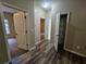 Hallway with access to bedrooms and closet at 4671 W Lake Se Dr, Conyers, GA 30094