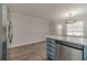 Modern kitchen with stainless steel appliances and island at 3581 Camelot Way, Loganville, GA 30052