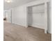 Unfinished basement with built-in shelving and closet at 2529 Amalfi Dr, Conyers, GA 30012