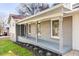 Charming front porch with gray brick columns and a wide, inviting walkway at 2529 Amalfi Dr, Conyers, GA 30012