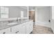 Main bathroom with double vanity and soaking tub at 4929 Calgary Dr, Douglasville, GA 30135
