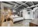 Spacious basement bedroom with exposed brick and concrete floors at 19 Hilliard Se St # 16, Atlanta, GA 30312