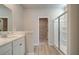 Bathroom features double vanity and a large walk-in shower at 2212 Croghan Drive, Hampton, GA 30228