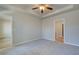 Main bedroom with wall-to-wall carpet and ample closet space at 2212 Croghan Drive, Hampton, GA 30228