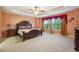 Spacious bedroom with large windows and carpeted floor at 4130 Brumby Ln, Cumming, GA 30041