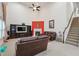 Gathering room with a fireplace and a view of the kitchen at 4130 Brumby Ln, Cumming, GA 30041