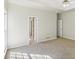 Bright bedroom with window, carpet, and access to bathroom at 3045 Wyntree Dr, Peachtree Corners, GA 30071