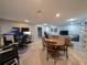 Finished basement featuring a game/office area and dining table at 5491 Deerfield Nw Pl, Kennesaw, GA 30144