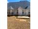 Simple backyard with patio and ample space at 539 Greyhawk Way, Fairburn, GA 30213
